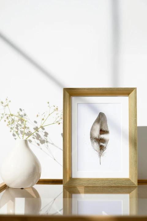 Image of a feather watercolor painting by Shayna Larsen, originals & prints available