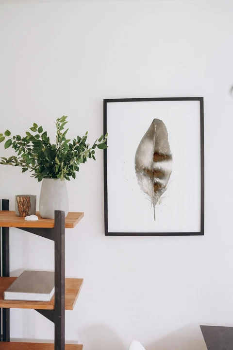 Image of a feather watercolor painting by Shayna Larsen, originals & prints available