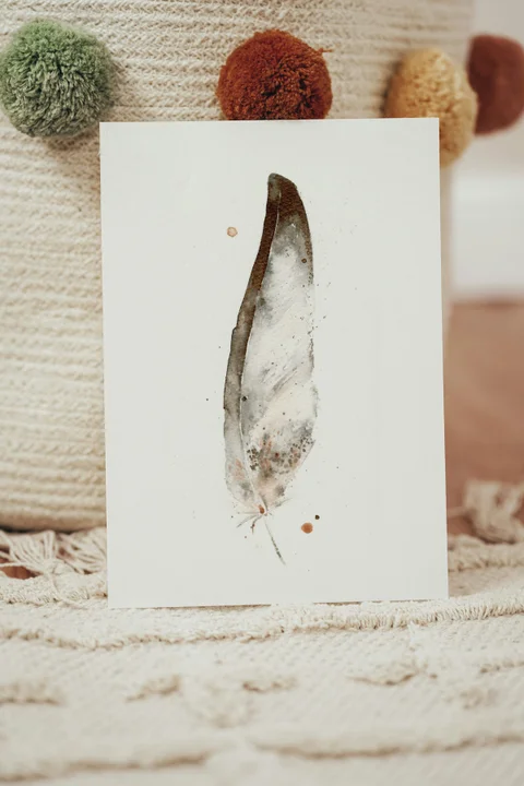 Image of a feather watercolor painting by Shayna Larsen, originals & prints available