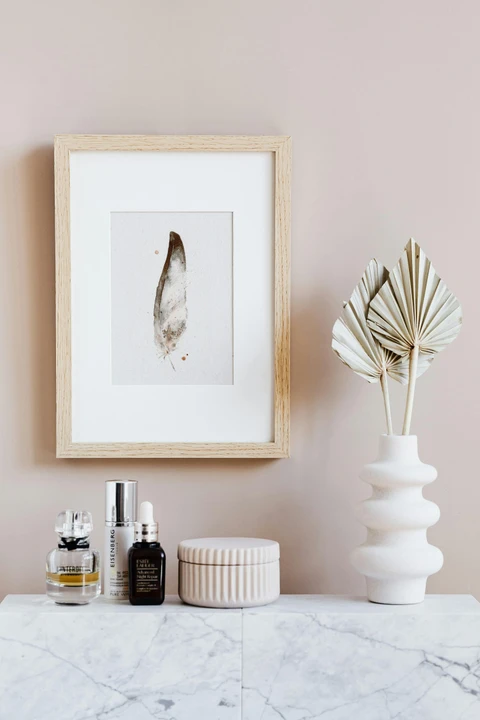 Image of a feather watercolor painting by Shayna Larsen, originals & prints available