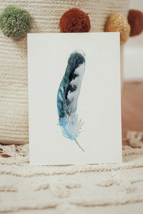 Image of a feather watercolor painting by Shayna Larsen, originals & prints available