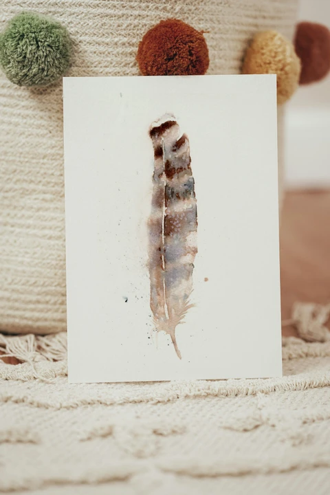 Image of a feather watercolor painting by Shayna Larsen, originals & prints available