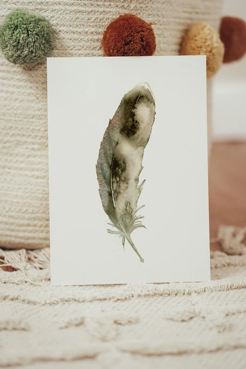 Image of a feather watercolor painting by Shayna Larsen, originals & prints available