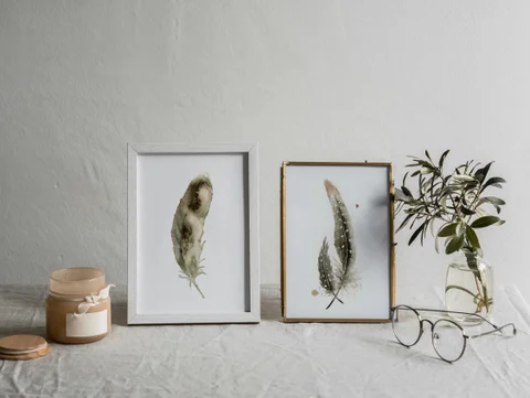 Image of a feather watercolor painting by Shayna Larsen, originals & prints available
