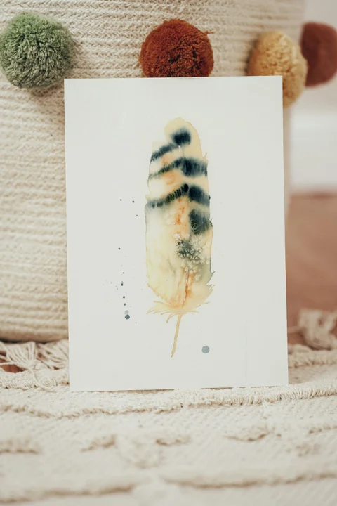 Image of a feather watercolor painting by Shayna Larsen, originals & prints available