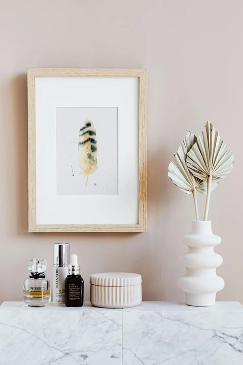 Image of a feather watercolor painting by Shayna Larsen, originals & prints available