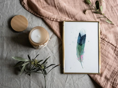 Image of a feather watercolor painting by Shayna Larsen, originals & prints available