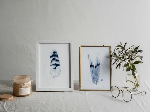 Image of a feather watercolor painting by Shayna Larsen, originals & prints available
