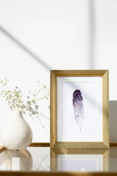 Image of a feather watercolor painting by Shayna Larsen, originals & prints available