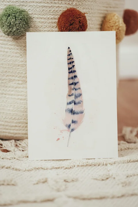 Image of a feather watercolor painting by Shayna Larsen, originals & prints available