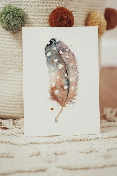 Image of a feather watercolor painting by Shayna Larsen, originals & prints available