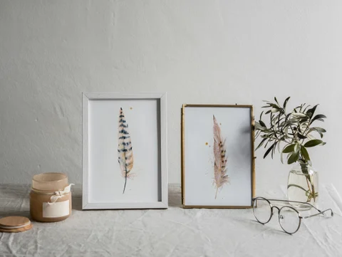Image of a feather watercolor painting by Shayna Larsen, originals & prints available