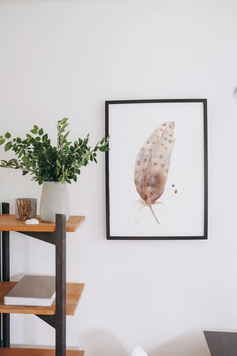 Image of a feather watercolor painting by Shayna Larsen, originals & prints available
