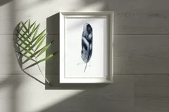Image of a feather watercolor painting by Shayna Larsen, originals & prints available