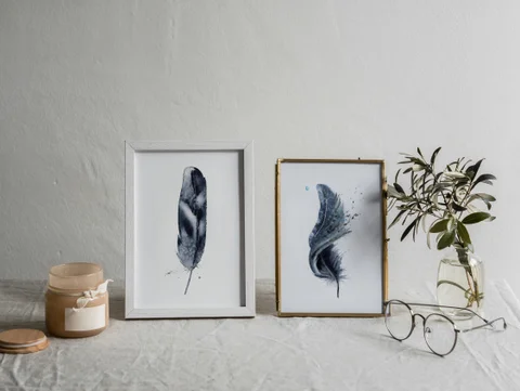 Image of a feather watercolor painting by Shayna Larsen, originals & prints available