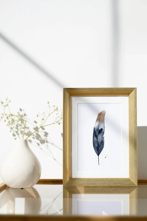 Image of a feather watercolor painting by Shayna Larsen, originals & prints available
