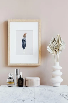 Image of a feather watercolor painting by Shayna Larsen, originals & prints available