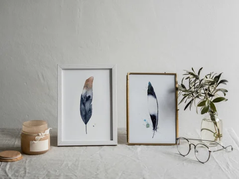 Image of a feather watercolor painting by Shayna Larsen, originals & prints available