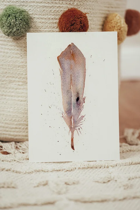 Image of a feather watercolor painting by Shayna Larsen, originals & prints available