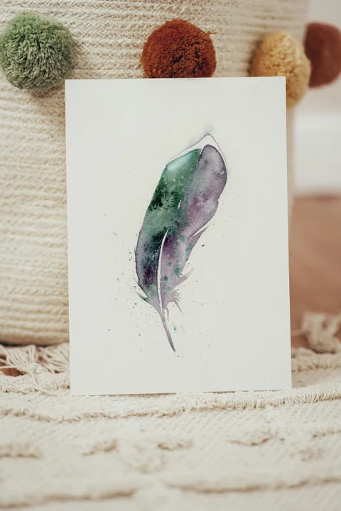 Image of a feather watercolor painting by Shayna Larsen, originals & prints available