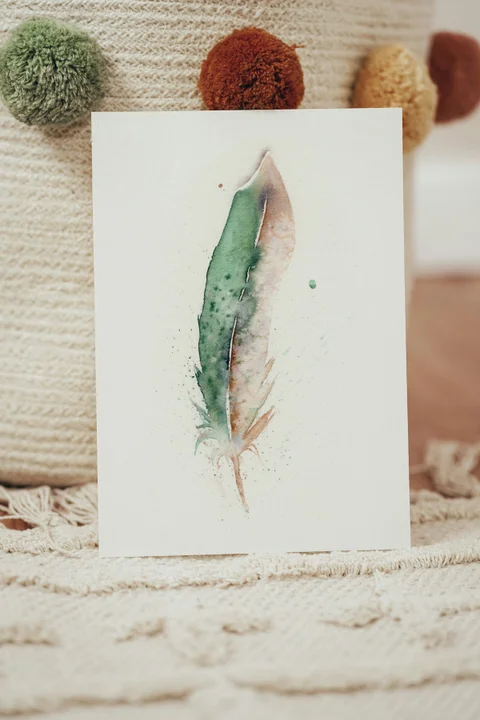 Image of a feather watercolor painting by Shayna Larsen, originals & prints available