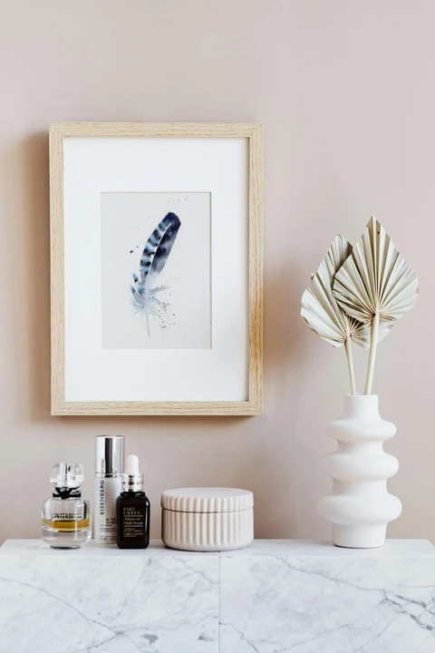 Image of a feather watercolor painting by Shayna Larsen, originals & prints available