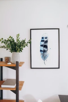 Image of a feather watercolor painting by Shayna Larsen, originals & prints available