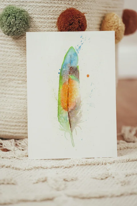 Image of a feather watercolor painting by Shayna Larsen, originals & prints available