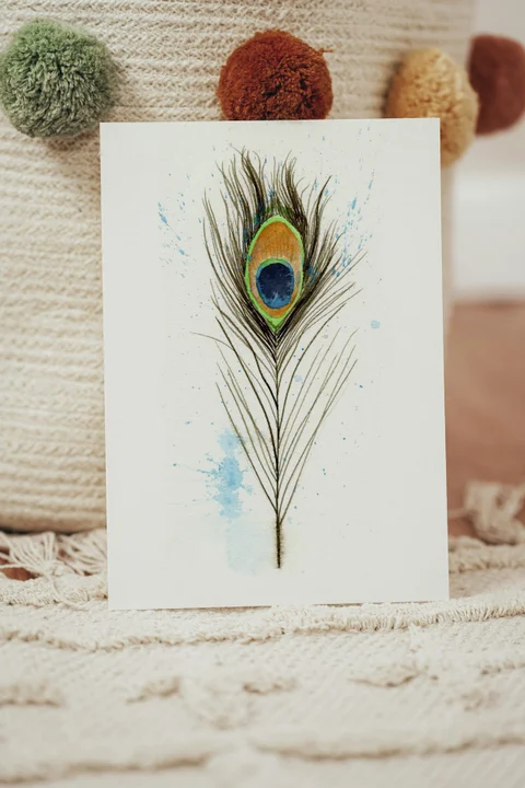 Image of a feather watercolor painting by Shayna Larsen, originals & prints available