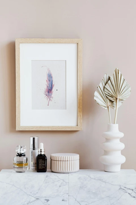 Image of a feather watercolor painting by Shayna Larsen, originals & prints available