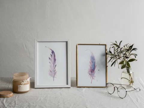 Image of a feather watercolor painting by Shayna Larsen, originals & prints available