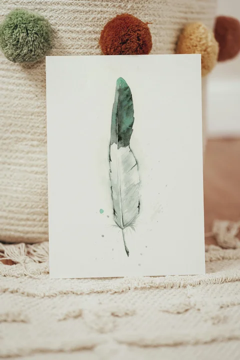 Image of a feather watercolor painting by Shayna Larsen, originals & prints available