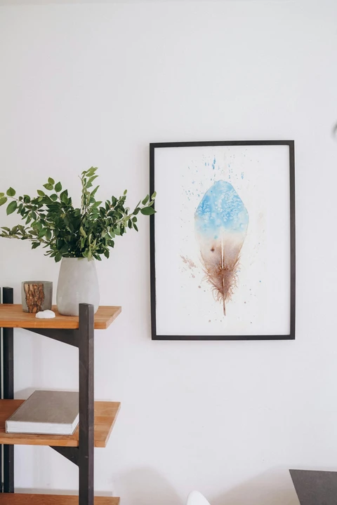 Image of a feather watercolor painting by Shayna Larsen, originals & prints available