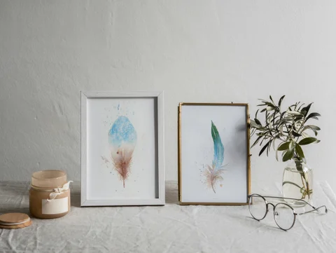 Image of a feather watercolor painting by Shayna Larsen, originals & prints available