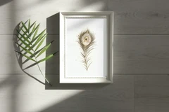 Image of a feather watercolor painting by Shayna Larsen, originals & prints available