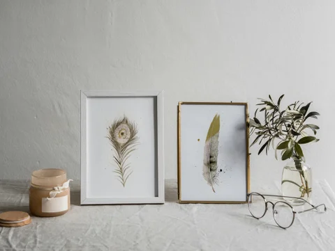 Image of a feather watercolor painting by Shayna Larsen, originals & prints available