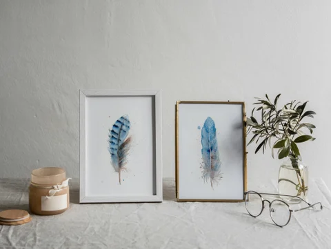 Image of a feather watercolor painting by Shayna Larsen, originals & prints available