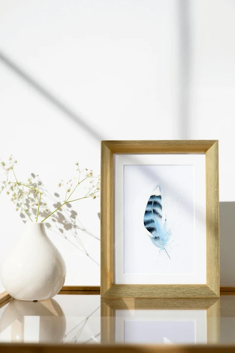 Image of a feather watercolor painting by Shayna Larsen, originals & prints available