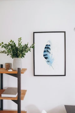 Image of a feather watercolor painting by Shayna Larsen, originals & prints available