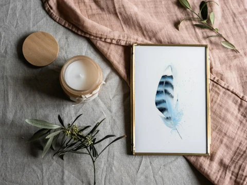 Image of a feather watercolor painting by Shayna Larsen, originals & prints available