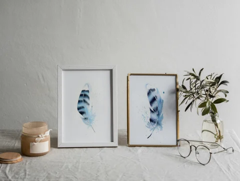 Image of a feather watercolor painting by Shayna Larsen, originals & prints available