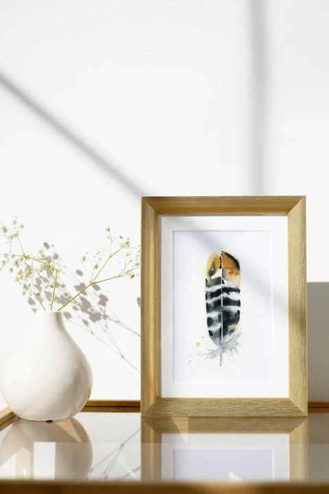 Image of a feather watercolor painting by Shayna Larsen, originals & prints available