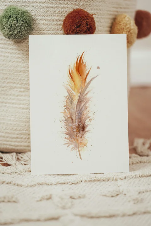 Image of a feather watercolor painting by Shayna Larsen, originals & prints available