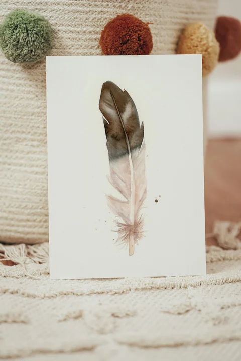 Image of a feather watercolor painting by Shayna Larsen, originals & prints available