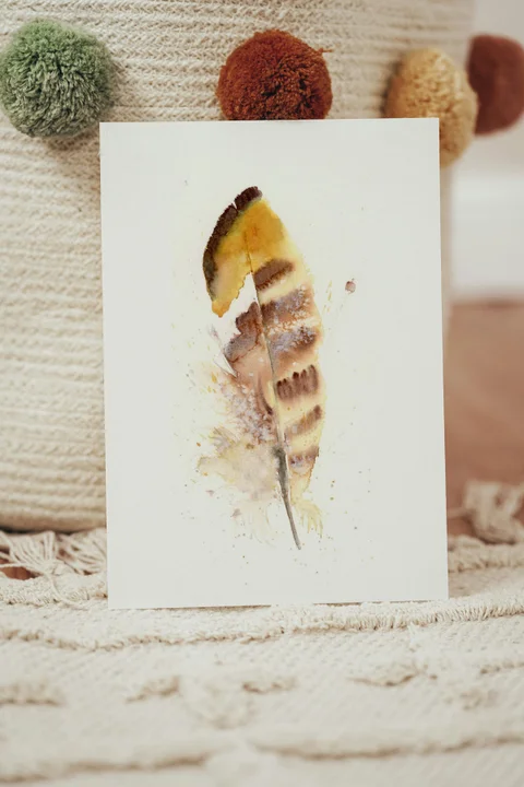 Image of a feather watercolor painting by Shayna Larsen, originals & prints available