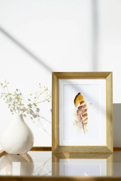 Image of a feather watercolor painting by Shayna Larsen, originals & prints available