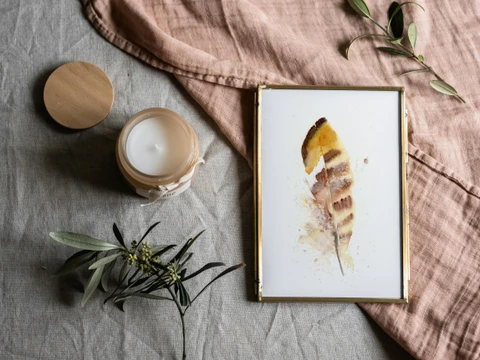 Image of a feather watercolor painting by Shayna Larsen, originals & prints available
