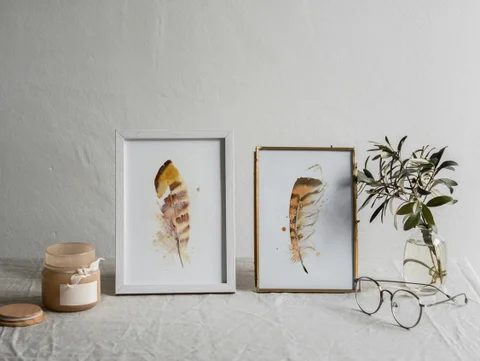 Image of a feather watercolor painting by Shayna Larsen, originals & prints available
