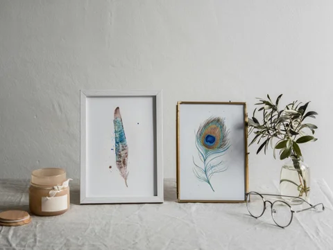 Image of a feather watercolor painting by Shayna Larsen, originals & prints available