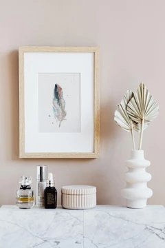 Image of a feather watercolor painting by Shayna Larsen, originals & prints available